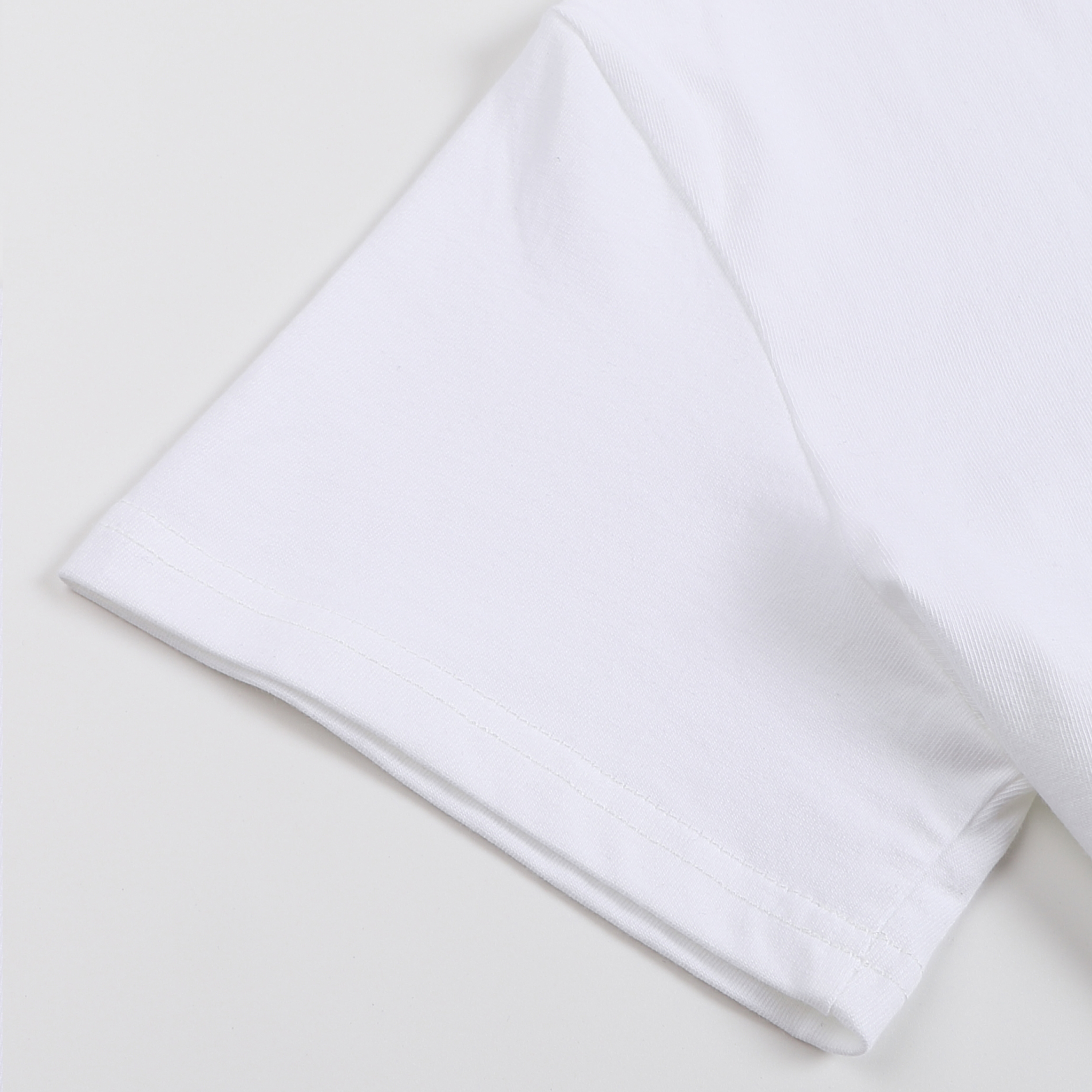 White folded towel on a light beige background