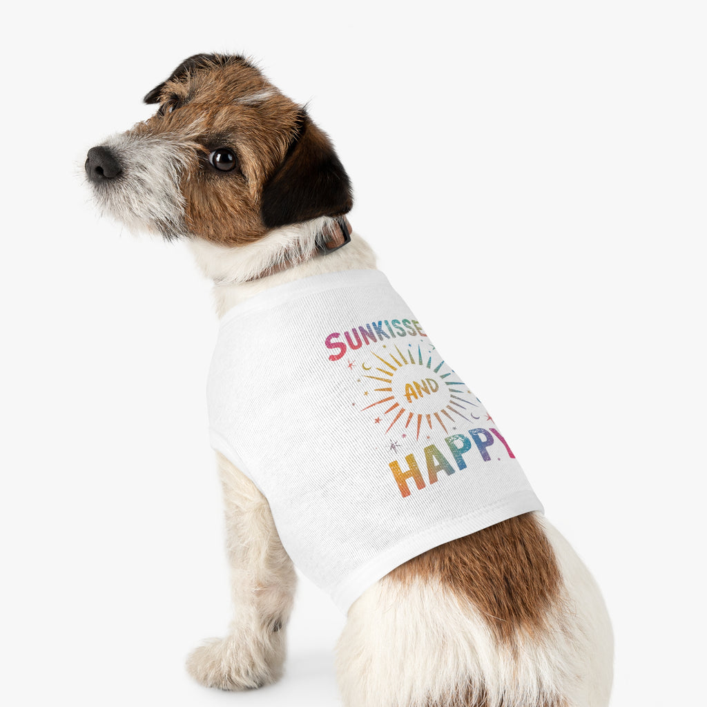Dog wearing a medium white t-shirt with colorful text on a white background